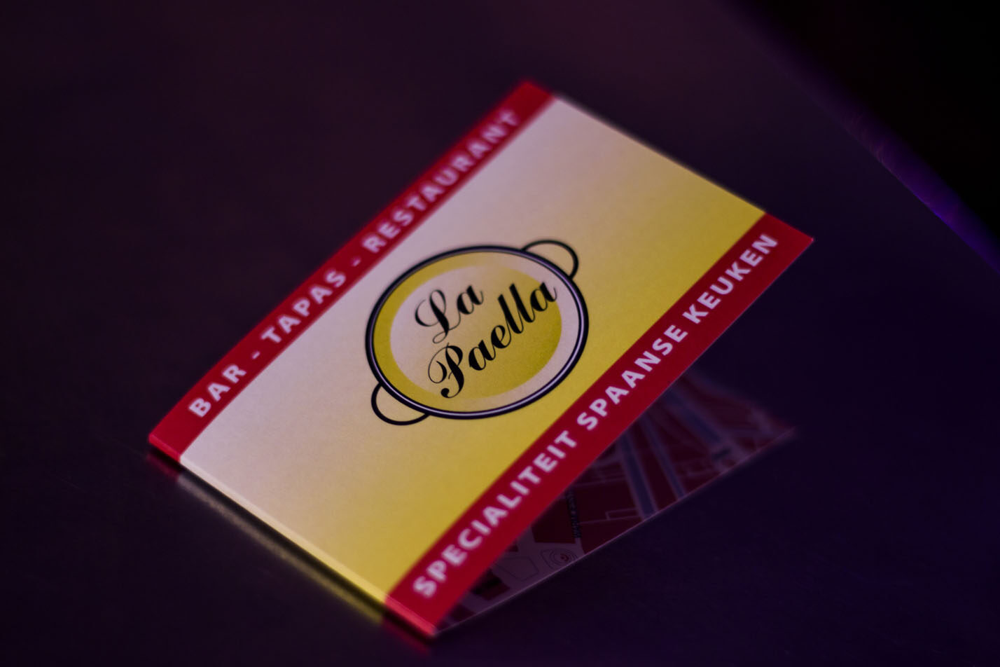 Kaartje met het logo van La Paella